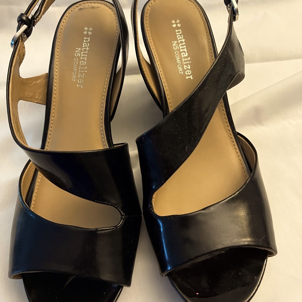 Black wedge sandals. Worn once. Like new.